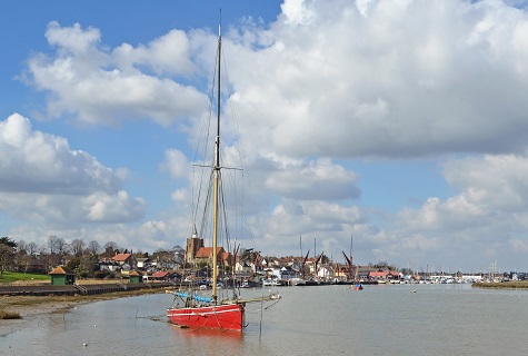 Red boat sailing out of Maldon