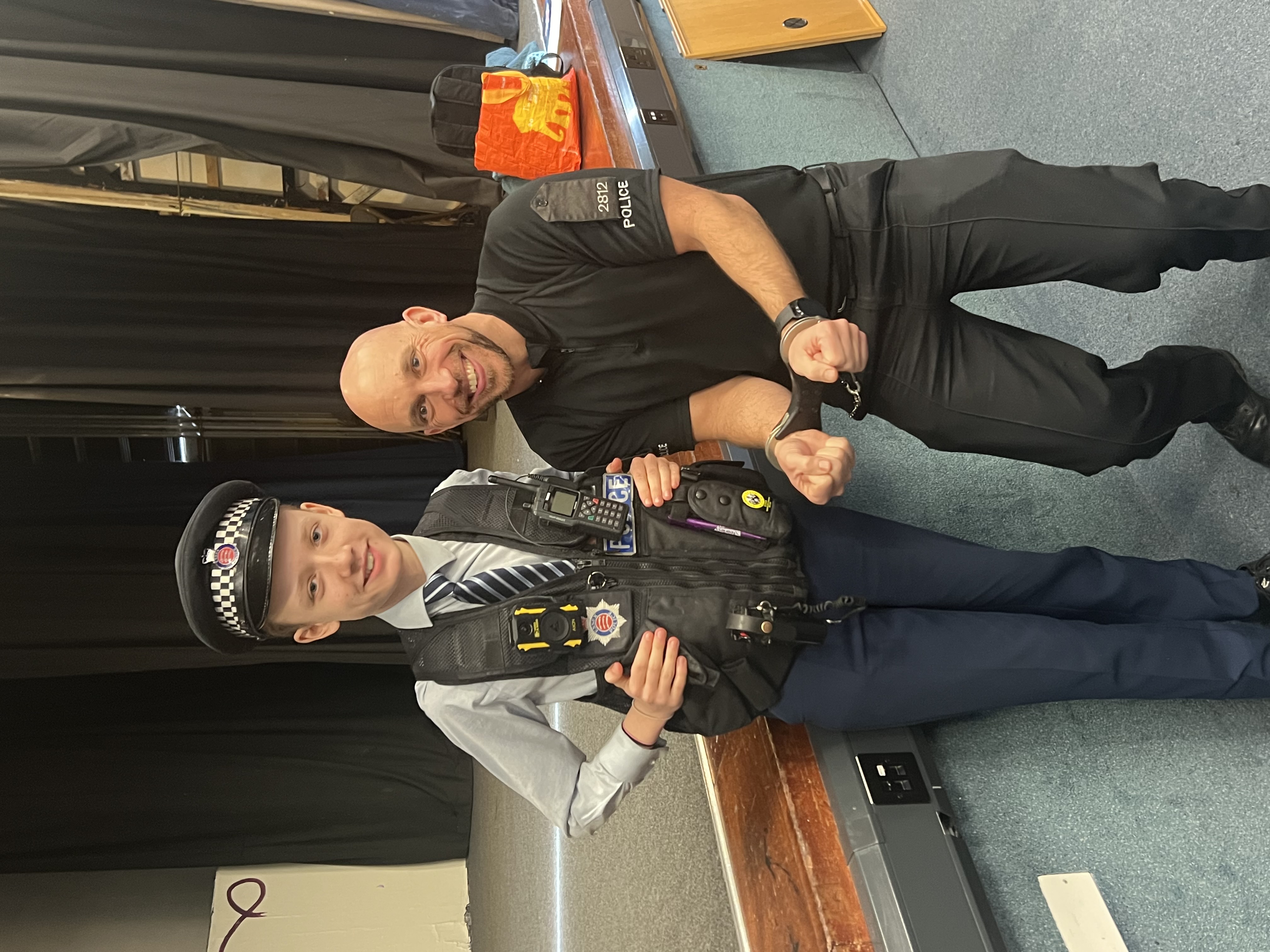 Member of the YEA being put in handcuffs